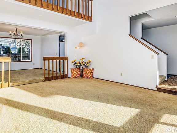 Another view of your living room with floor to ceiling window you get an abundance of light in your living room and dining room.