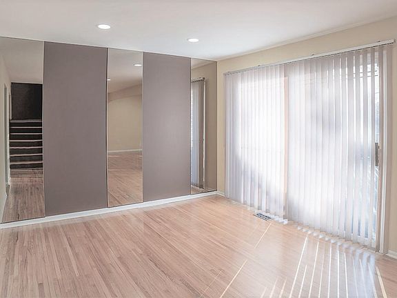 Dinning Room with solid oak flooring leading to open out door deck for Spring Entertaining.