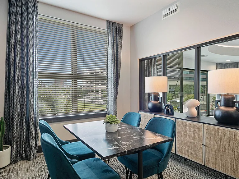 Conference table and workspaces available with Wi-Fi access