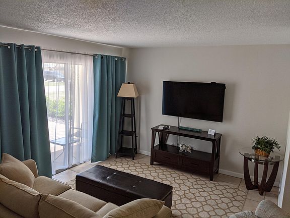 Living room with Roku television and Spectrum cable.