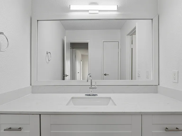 Onebedroom One bathroom large vanity and sink.