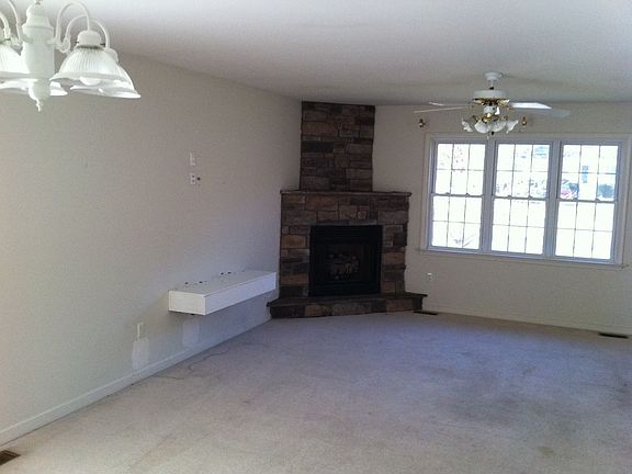 Living Room with Stone Fireplace