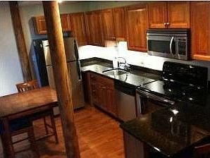 Open kitchen with granite/stainless