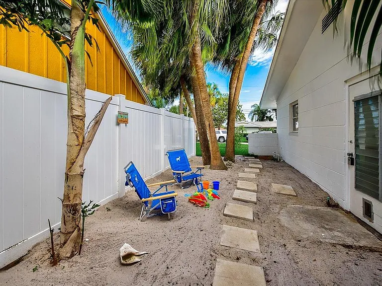 Kids LOVE our side yard beach. Beach toys, 4 beach chairs, and beach umbrella included.
