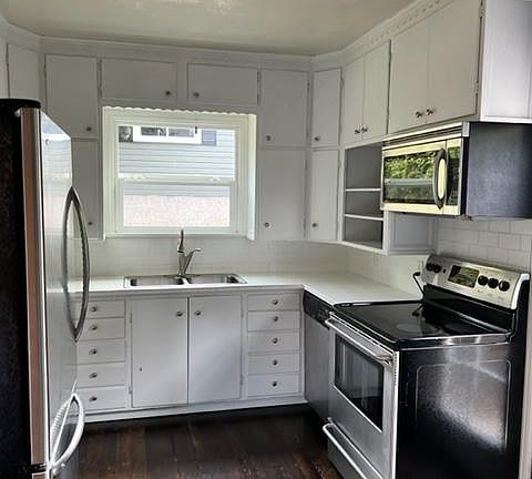 Kitchen with updated appliances.