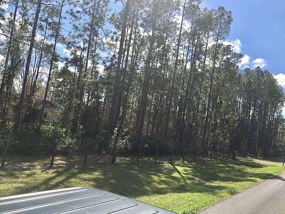 Main road to access the gated entrance to the property.