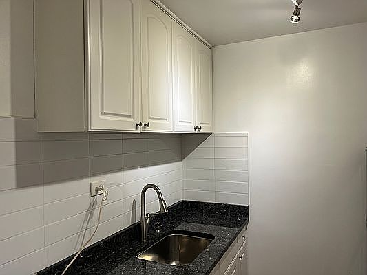 5th image of 125-16 83rd Dr #1E