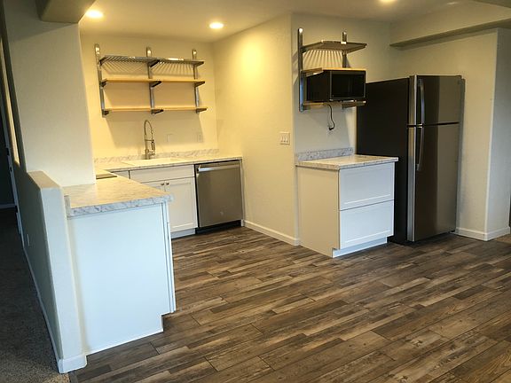 Brand New Kitchen - Dishwasher, fridge, microwave, 10-1 Ninja Oven, Washer, and Dryer included in other room.