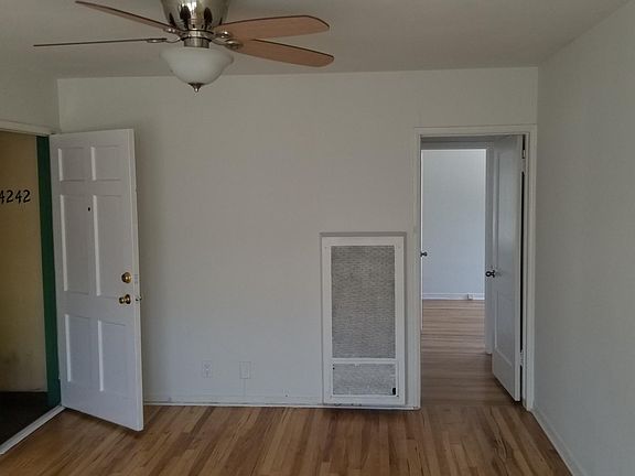 FRONT DOOR / LIVING ROOM INTO BEDROOMS