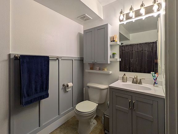 large bathroom with wide door and extra space
