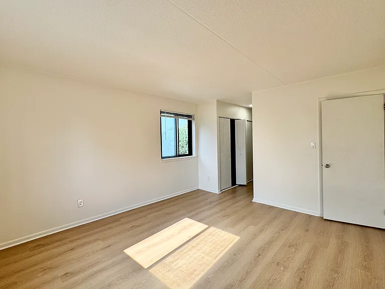 Spacious primary suite with ample natural light