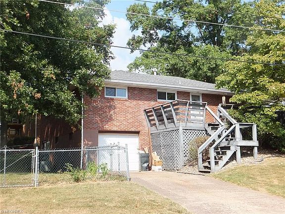 Side View, single garage opening dbl wide inside