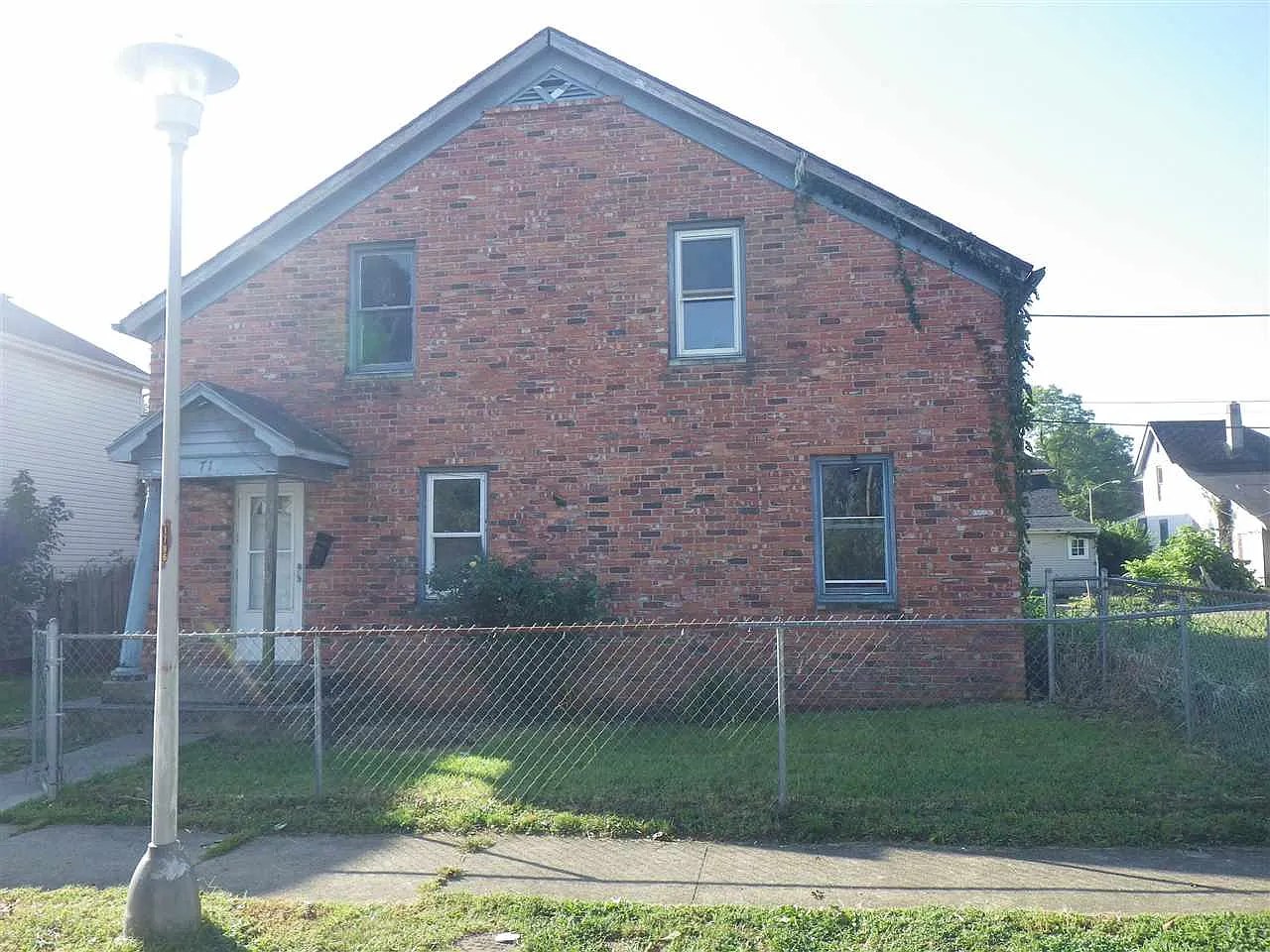 71 NW East St photo 1