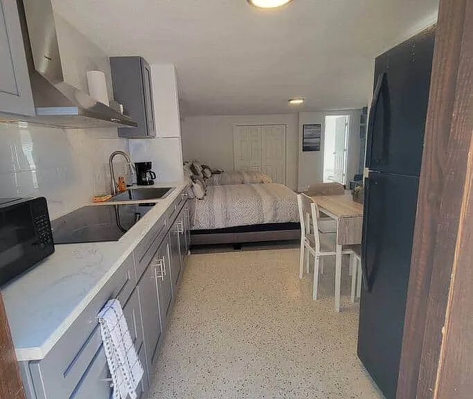 Fully equipped modern kitchen with dishwasher and essential comforts.