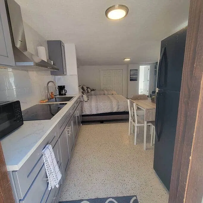 Fully equipped modern kitchen with dishwasher and essential comforts.