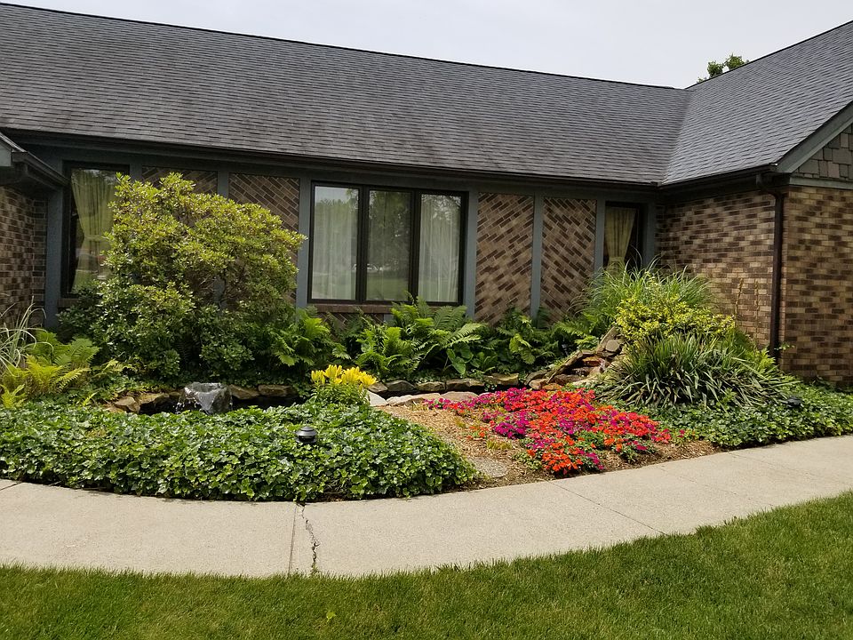 Fountains!  Front flower bed
