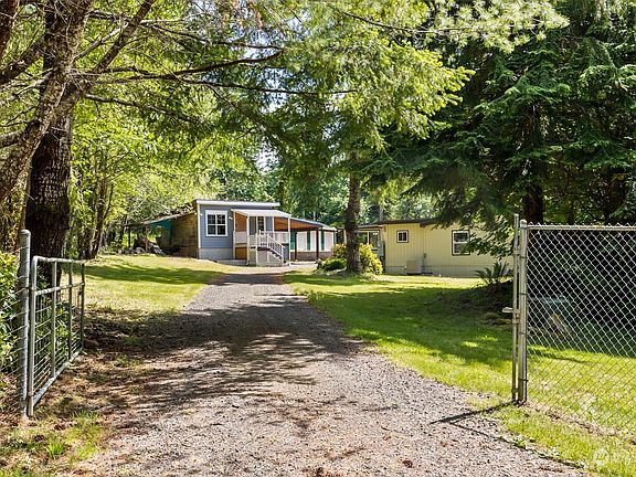 Gated entrance with security system included with home.>