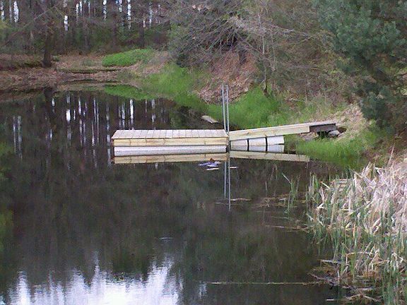 Fishing dock on the pond