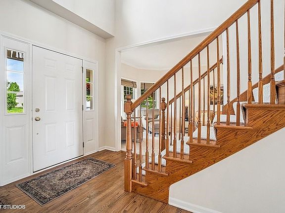 Two Story Foyer / Oak Floors