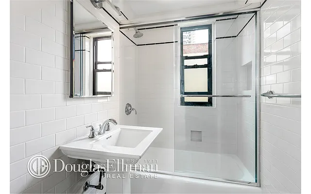 Sold by Douglas Elliman | media 18