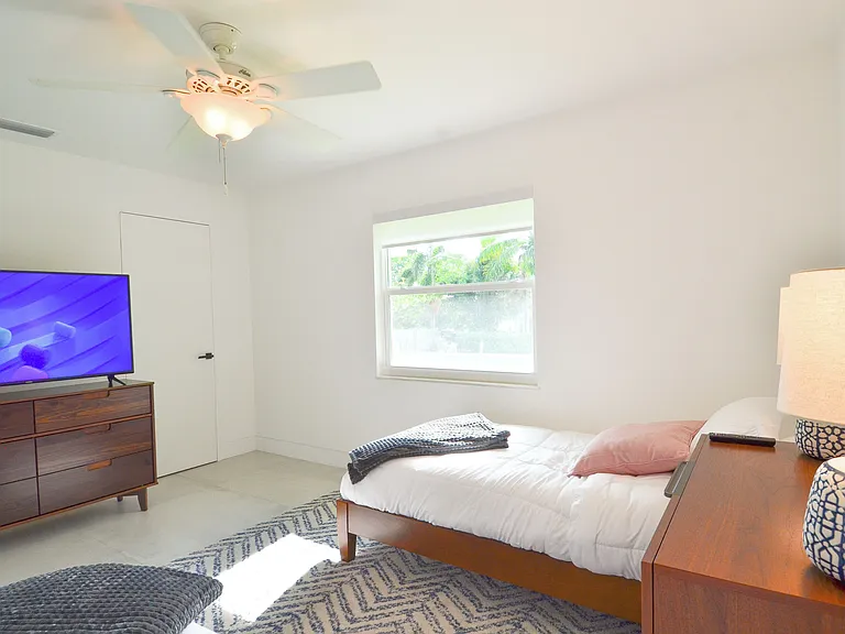 Third bedroom, two win beds, dresser, smart TV and closet