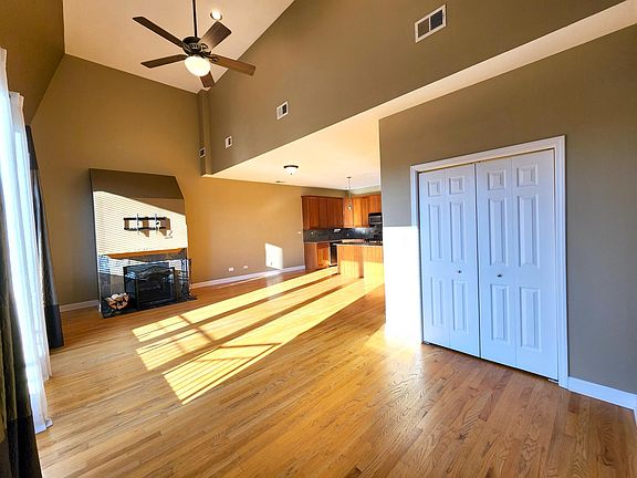 Vaulted Ceiling, Open Floor Plan, Living Room, Dining Room, and Kitchen Area