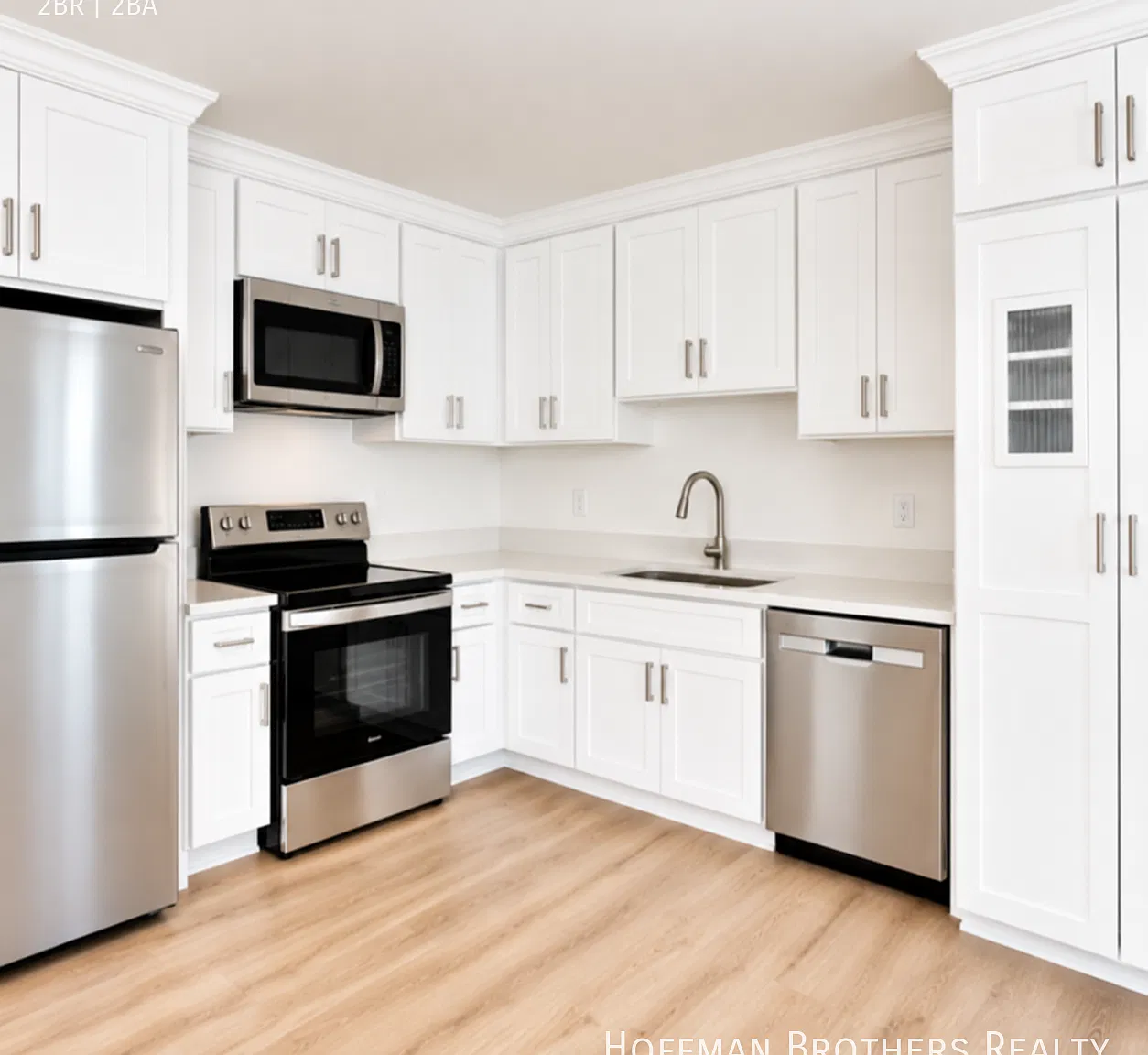 **1 Month Free Renovated 2 Bedroom with In-Unit Laundry, Central A/C, Quartz Kitchen & Stainless ... — Photo 2