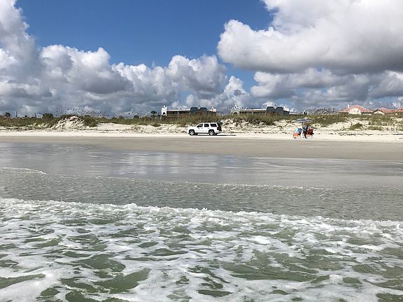 view from ocean - park on sand condo in rear with path