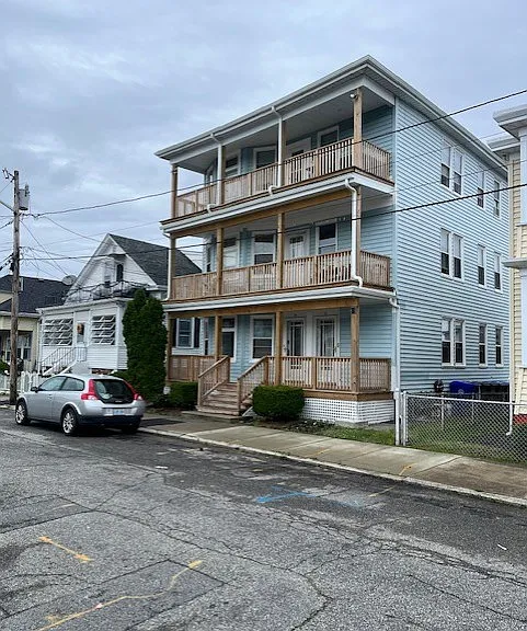 Outside of building. New Porches, gutter and roof.