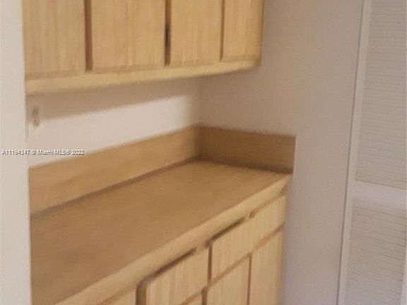 3rd image of 303 Gardens Dr APT 105
