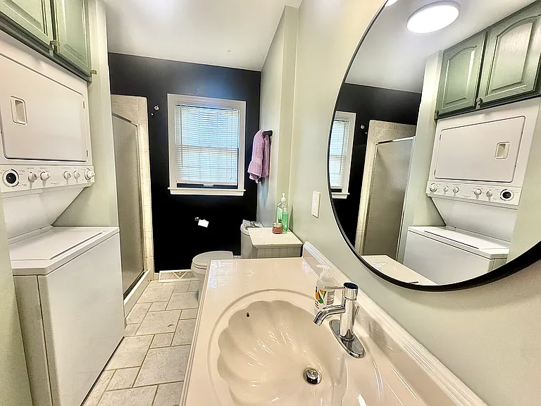 319 E 100th Ter — Photo 14