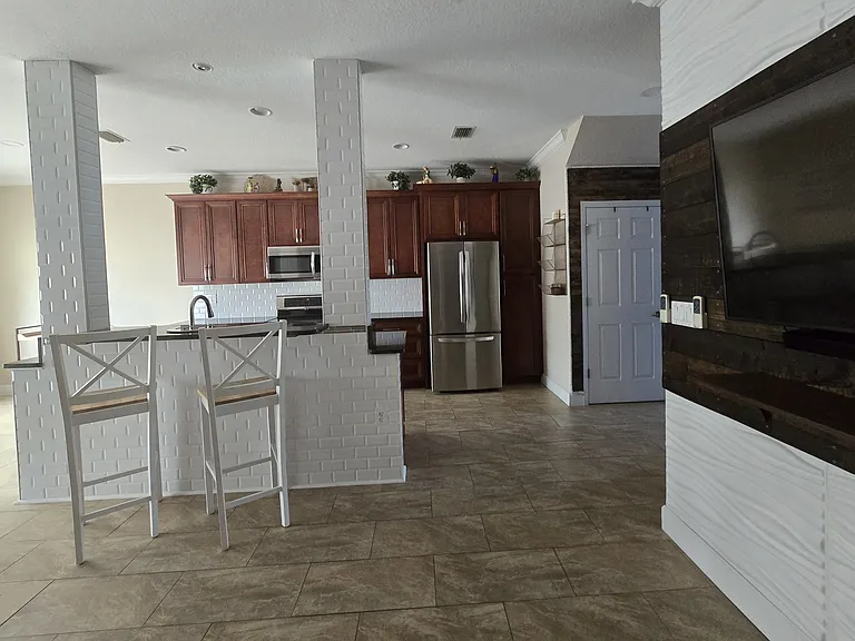 Living room looking into kitchen