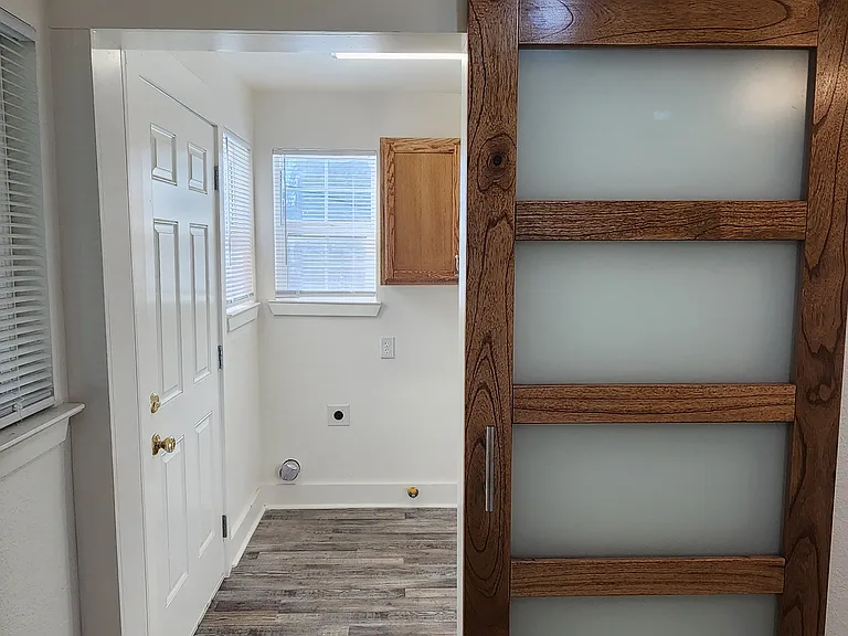 Door to laundry room from dining area