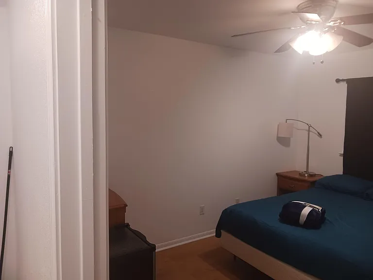 Looking left now, the mini-fridge and large dresser come into view.