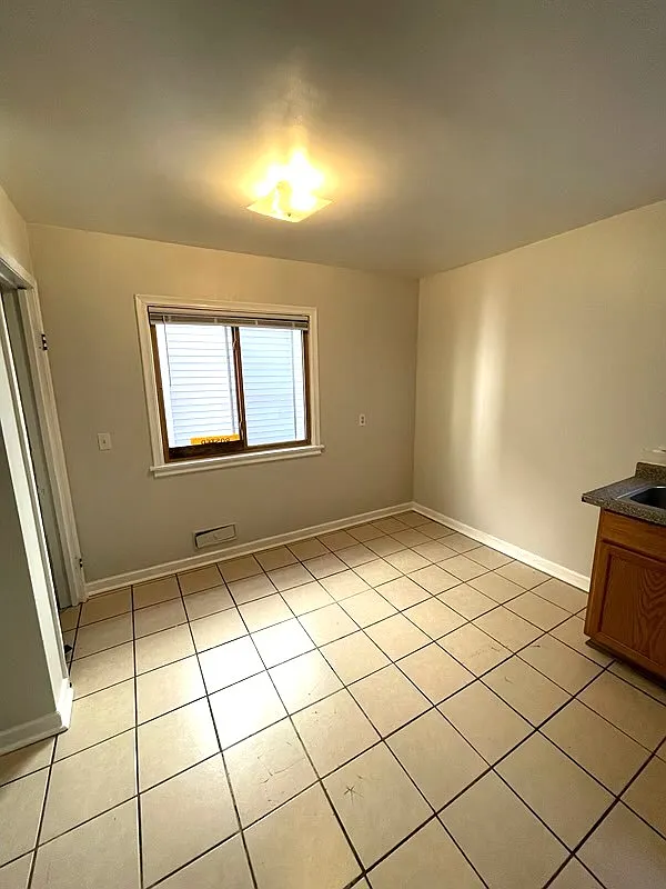 Building Photo - 3124 Logan Ave N #2