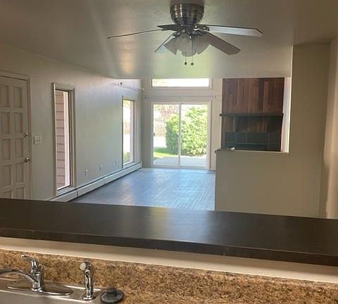 Living room and front porch view from Kitchen