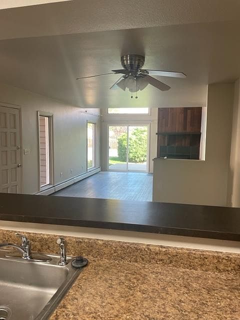 Living room and front porch view from Kitchen