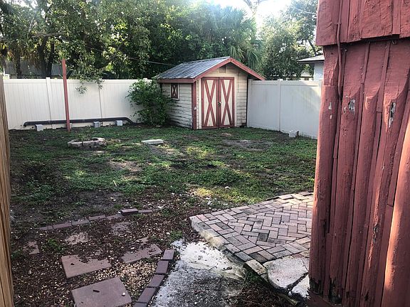 Fenced in backyard (the storage shed in photos does not go with the house