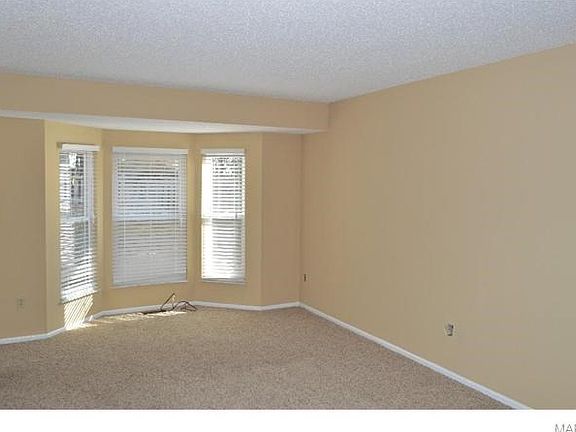 Master bedroom has bay window to backyard