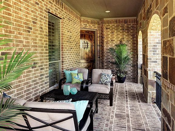 Another view of the lovely porch and front door.