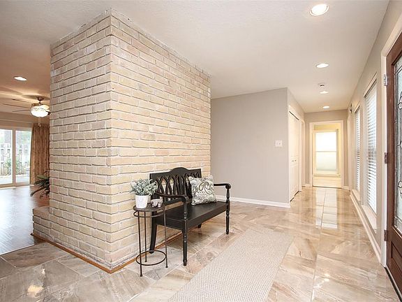 Gorgeous marble floors greet you when you walk into the large, well lit entry.