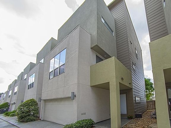 Exterior of home has a modern sleek geometrical appeal