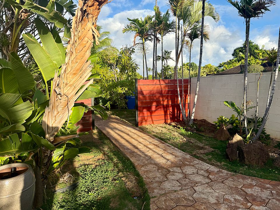 New fence. This unit has a fully fenced in side yard.