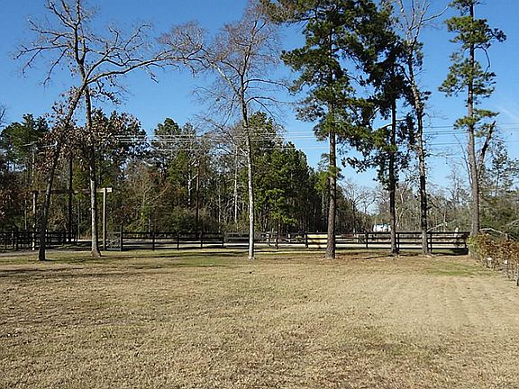 View from the middle of the front yard towards Riley Rd. 85 oleanders were recently planted to provi
