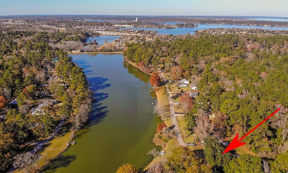 Adorable three bedroom two bath cottage in the sought after subdivision of Pine Lake!