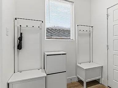 The mud room - located between the front door and the door to the attached garage is on the main floor, and provides a place to remove and store shoes and other objects. There is also a coat closet next to the front door.