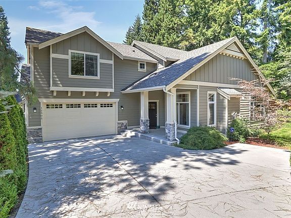 Prepare to fall in love as soon as you arrive at this stunning home! You're going to swoon over this chic home in the sought-after neighborhood of Finn Hill. This home is tucked down a private driveway, away from the street. It's close to the sights and fun of both downtown Kirkland and Juanita! Great schools, Juanita Beach park, St. Edward (326-acre) park plus cafes and additional dining options just minutes away!  The Lodge just opened and is awesome!  Featuring dining and spa services super close by. 