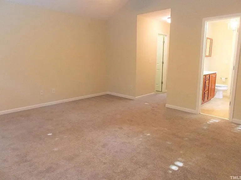 Primary bedroom with Primary bathroom