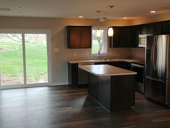 Kitchen/ dining area. Sliding glass doors to patio/ backyard