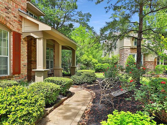 Sidewalk leads you to large covered front porch.